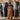 Person wearing a brown apron with 'CHA' logo in a warehouse setting with 3M Thinsulate Roll in background