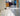 Modern office interior with polished concrete floors and glass walls.